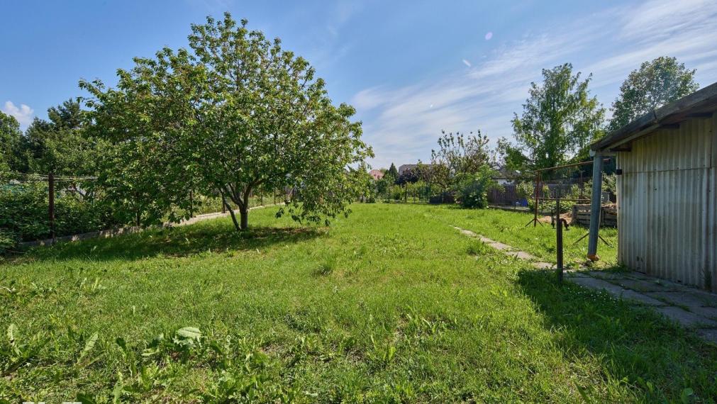 Neibrs | Rodinný dom s prístavbou, garážou a samostatnou bytovou jednotkou, pozemok 1115 m2